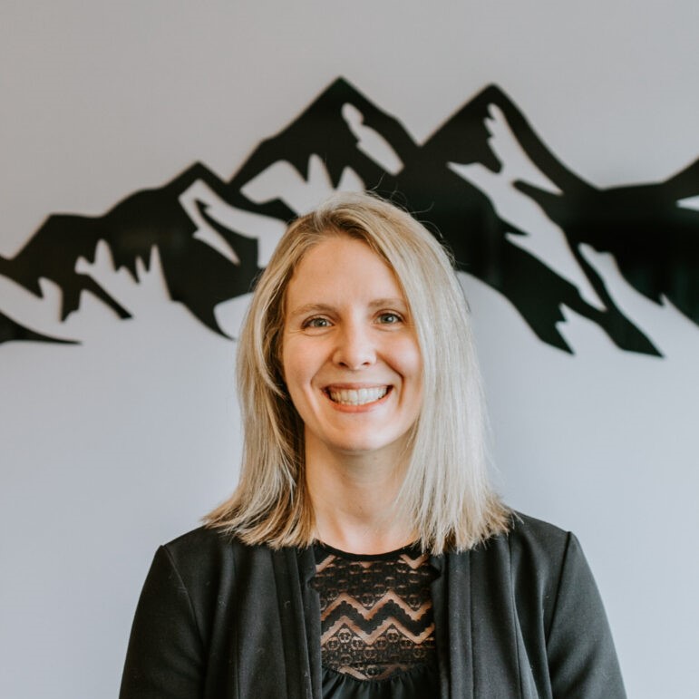 A close up image of a woman who is smiling
