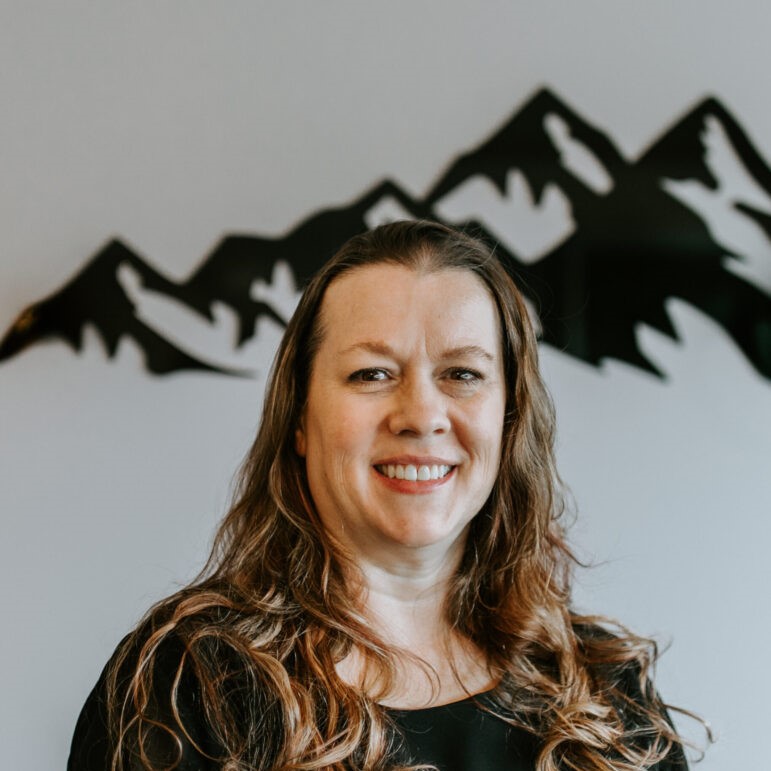 A close up image of a woman who is smiling