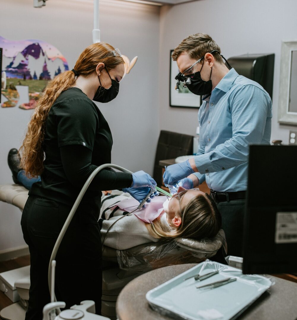 A photo of a dental patient being treated in a dentist room