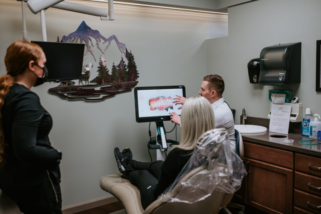 A photo of a dental patient being treated in a dentist room